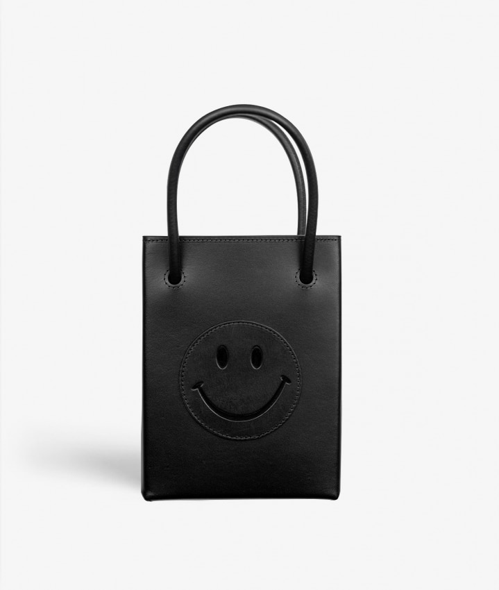 Essential Crossbody Tas Smiley Vegetable Tanned Black